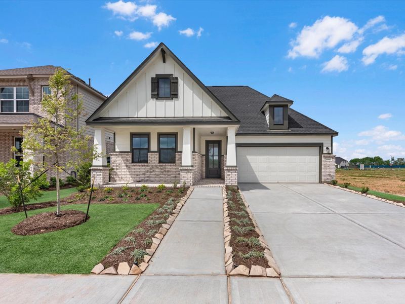 Front exterior of a new home in Austin Point, Richmond, TX, highlighting curb appeal (Image 1). Front exterior of a new home in Austin Point, Richmond, TX, highlighting curb appeal (Image 1).