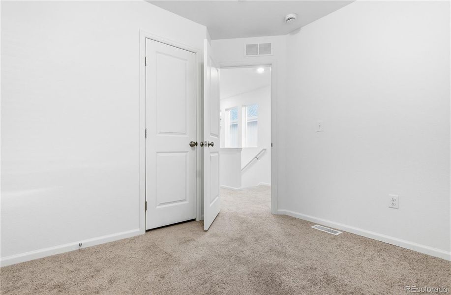 Spacious, unfurnished interior of a new home in Reunion, Commerce City (Image 18).