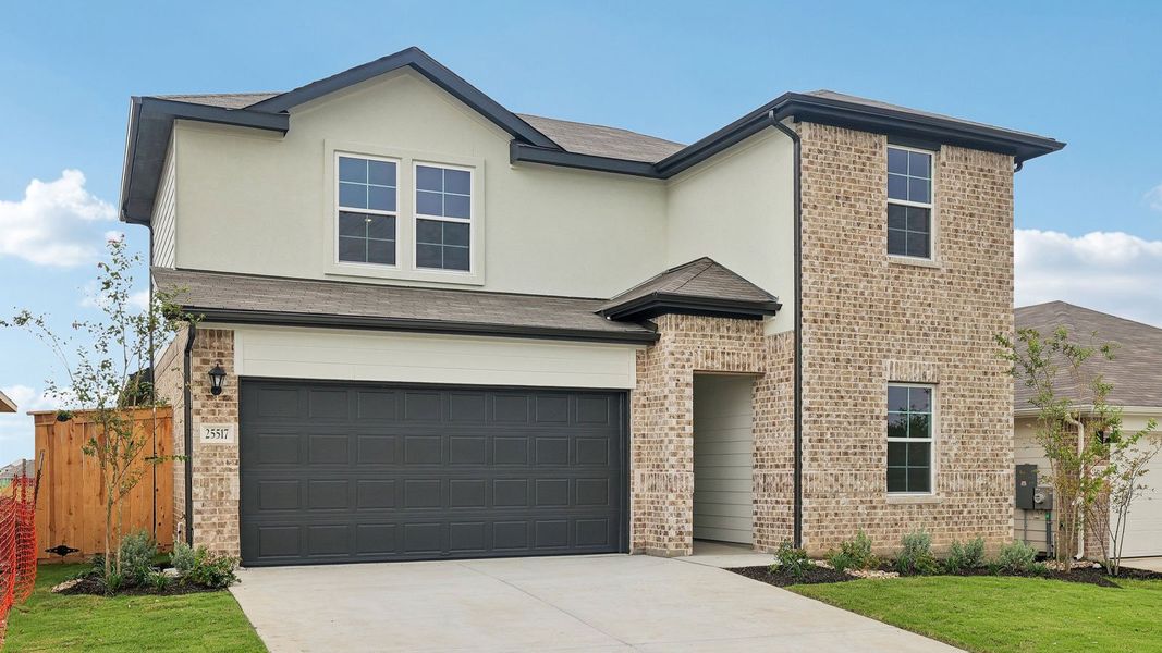 Front exterior of a new home in Briarwood, Elgin, TX, highlighting curb appeal (Image 2).