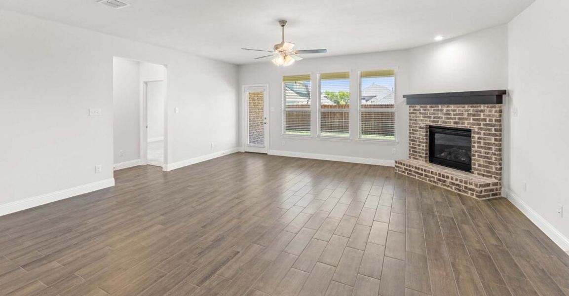 Representative exterior photo of a completed home built from the Goodrich by Impression Homes in Timberbrook, Justin, TX (Image 10).