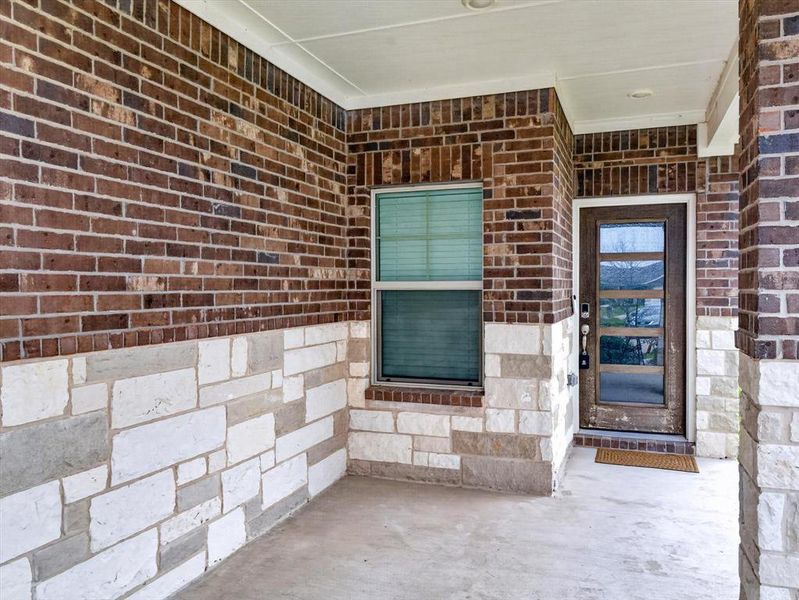 Exterior details and patio area of a home in Eastridge - Spring Series, McKinney (Image 3).