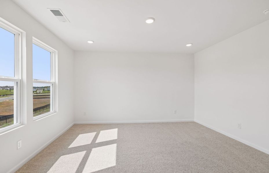 Spacious, unfurnished interior of a new home in Highlands of Carter's Station, Columbia (Image 34).