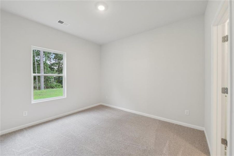 Spacious, unfurnished interior of a new home in Stephen's Landing, Loganville (Image 38).
