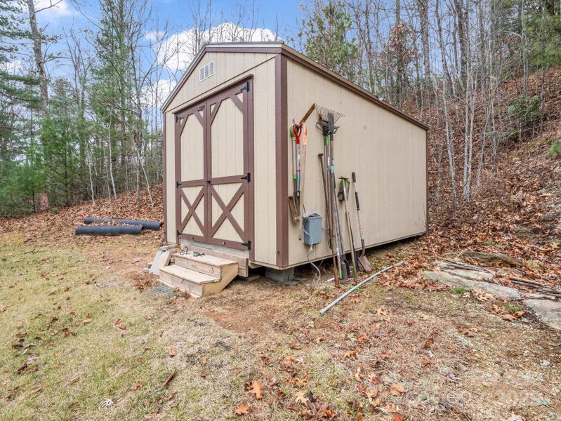 Exterior details and patio area of a home in , Black Mountain (Image 27).