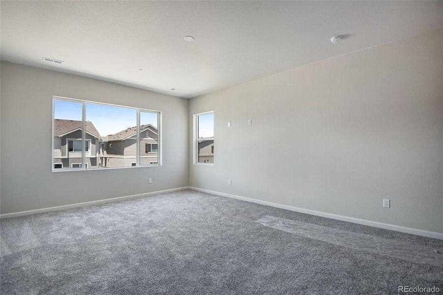 Spacious, unfurnished interior of a new home in Reunion Ridge, Commerce City (Image 34).