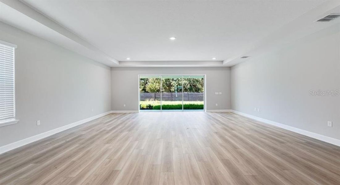 Spacious, unfurnished interior of a new home in The Cove at West Port, Port Charlotte (Image 15).