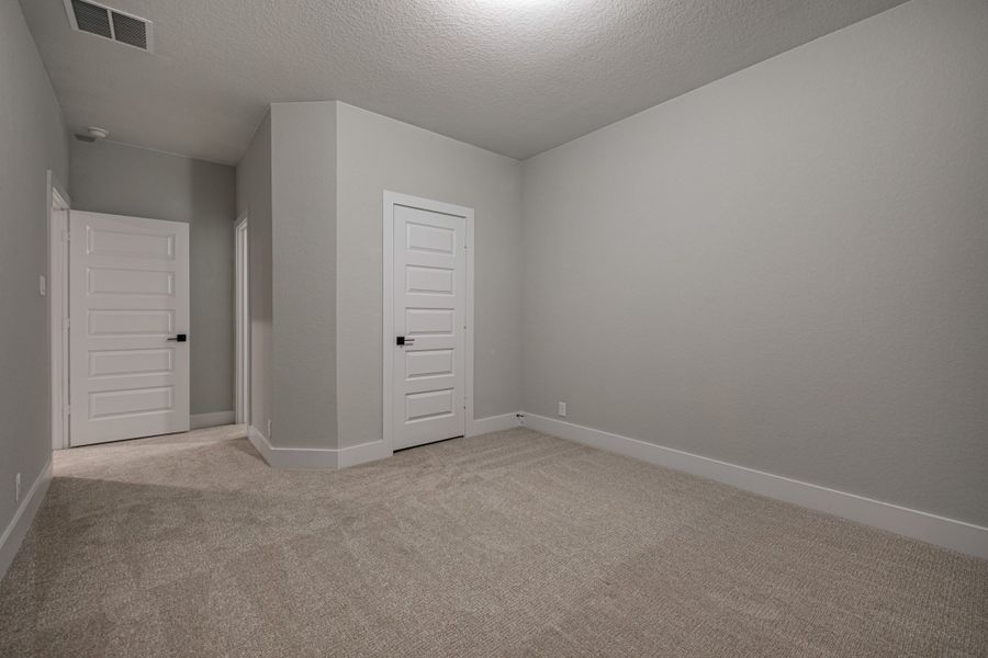 Spacious, unfurnished interior of a new home in The Reserve at Potranco Oaks, Castroville (Image 29).