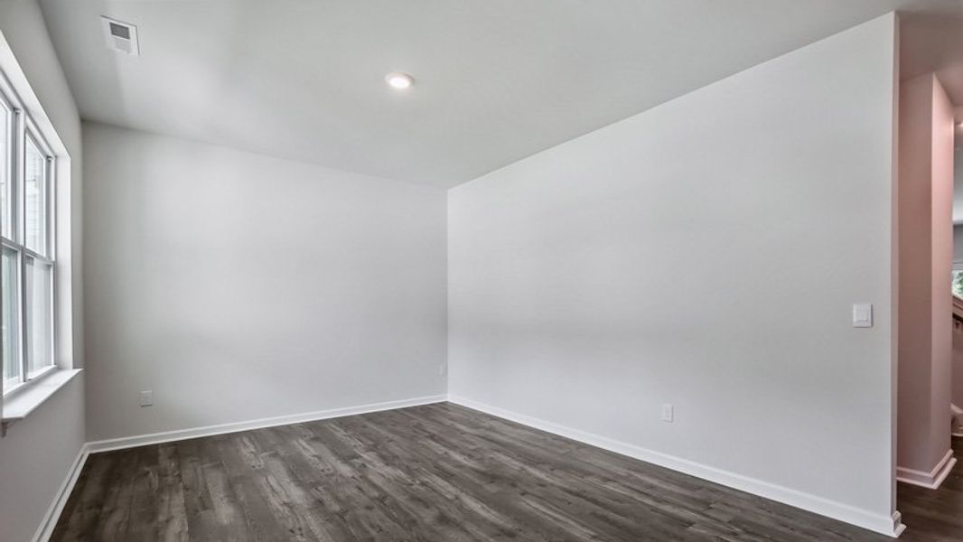 Spacious, unfurnished interior of a new home in The Estates at Edinborough, Gibsonville (Image 13).