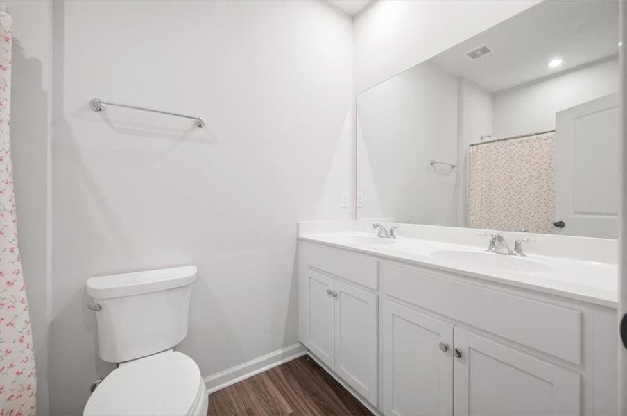 Furnished interior view inside a new home in Enclave at Edgewater, Holly Springs (Image 37).