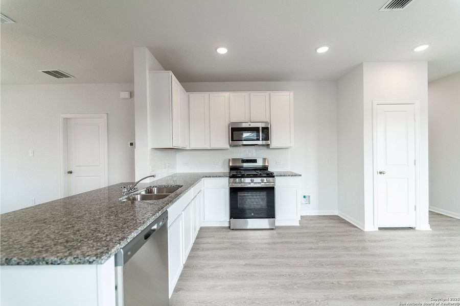 Furnished interior view inside a new home in Willow View, Converse (Image 2). Furnished interior view inside a new home in Willow View, Converse (Image 2).