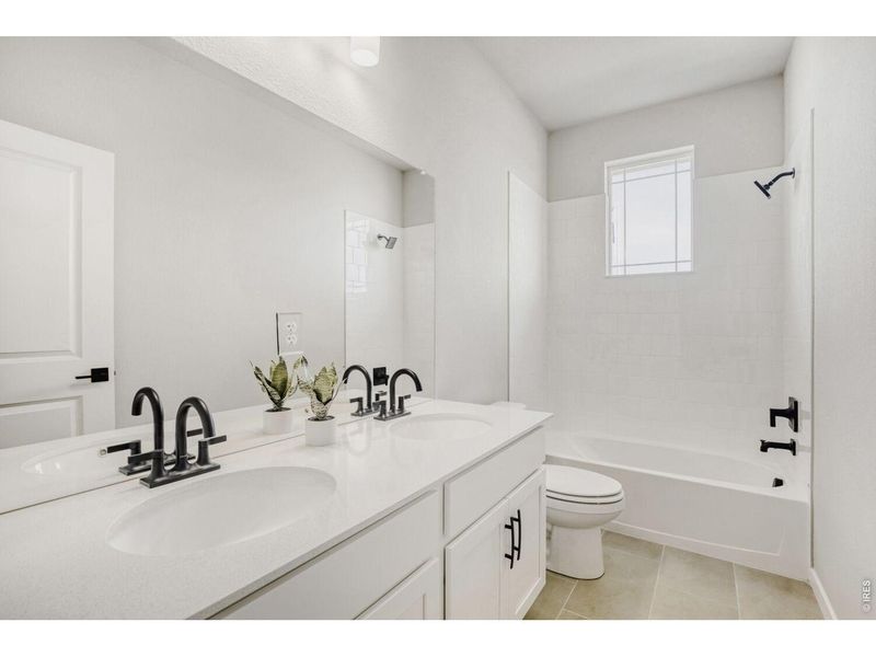 Furnished interior view inside a new home in Farmstead, Berthoud (Image 10).