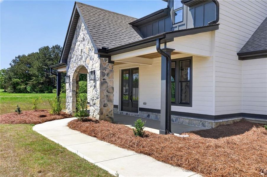 Exterior details and patio area of a home in The Meadows at Lake Circle, Buchanan (Image 30).