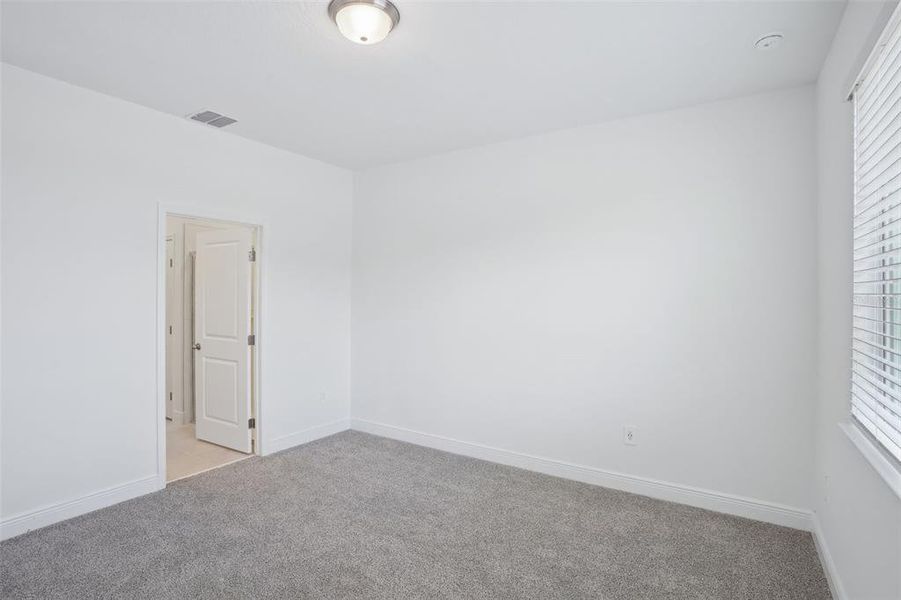 Spacious, unfurnished interior of a new home in Cyrene at Minneola - Villas, Montverde (Image 30). Spacious, unfurnished interior of a new home in Cyrene at Minneola - Villas, Montverde (Image 30).