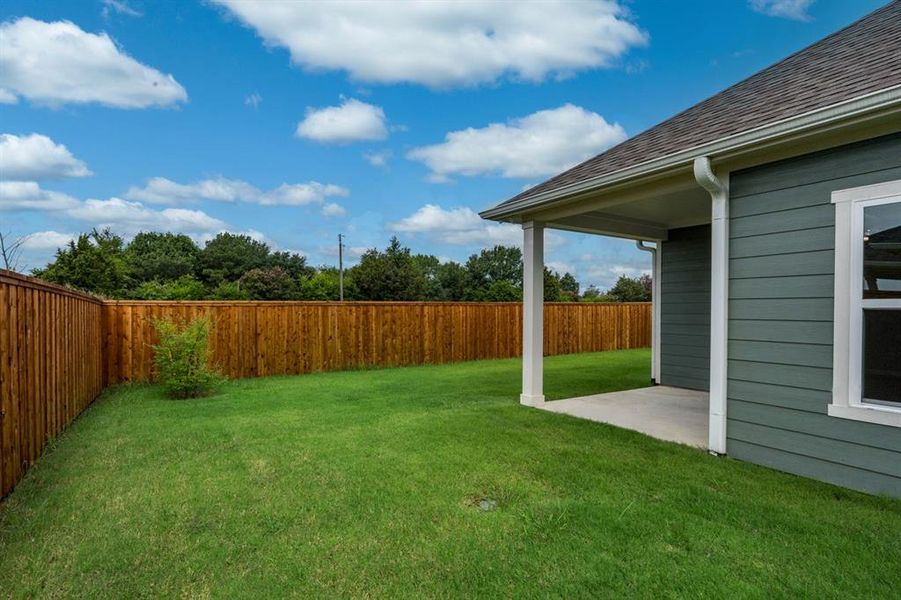 View of yard with a patio