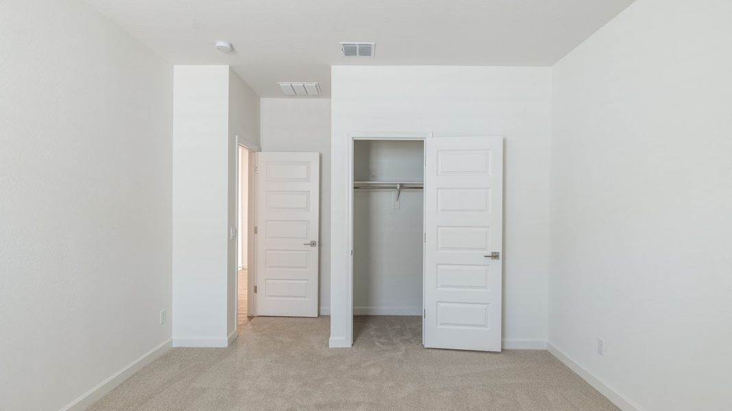 Spacious, unfurnished interior of a new home in Zanjero Pass, Waddell (Image 29).