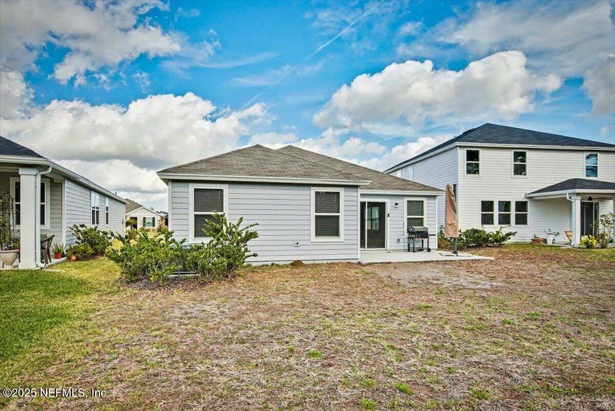 Exterior details and patio area of a home in , Palm Coast (Image 4).