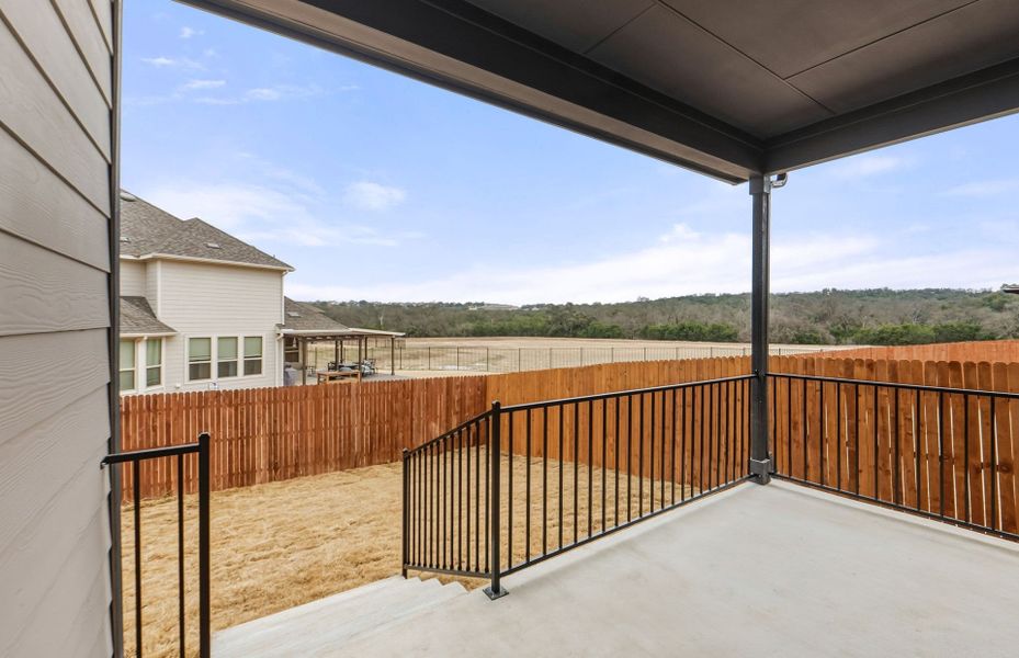 Exterior details and patio area of a home in Saddleback at Santa Rita Ranch, Liberty Hill (Image 28).