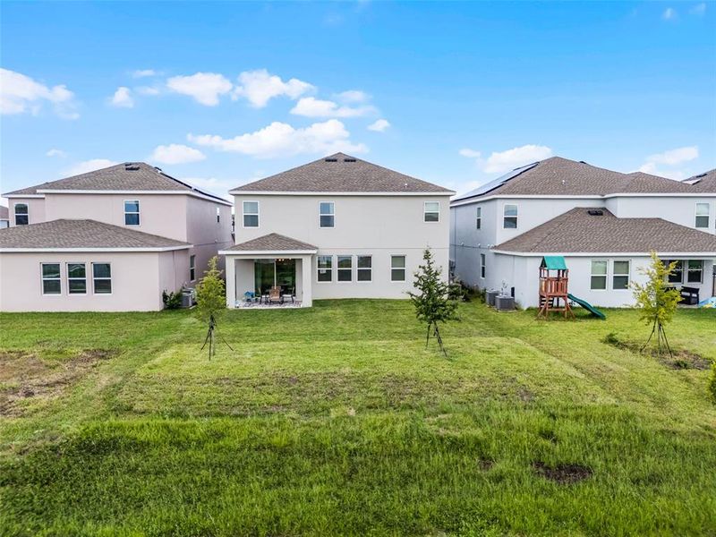 Front exterior of a new home in , Orlando, FL, highlighting curb appeal (Image 25).