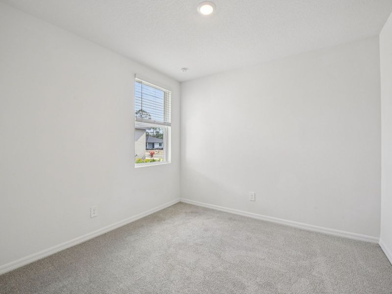 Spacious, unfurnished interior of a new home in Ridgehaven - Villas, Ormond Beach (Image 16).