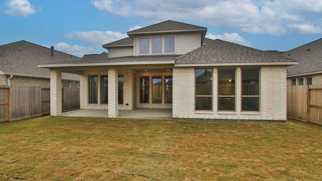 Exterior details and patio area of a home in Riceland, Mont Belvieu (Image 3).