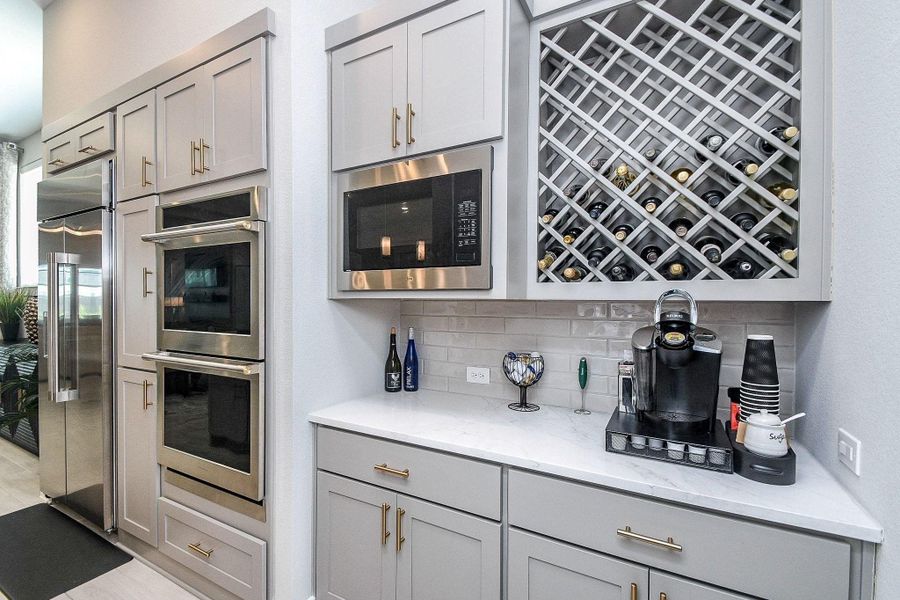 Convenient coffee center and wine rack. Convenient coffee center and wine rack.