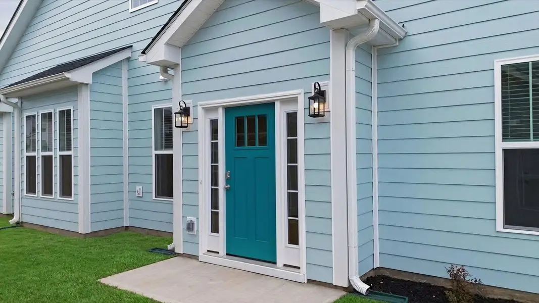 Exterior details and patio area of a home in Village at Midway, Anderson (Image 3).