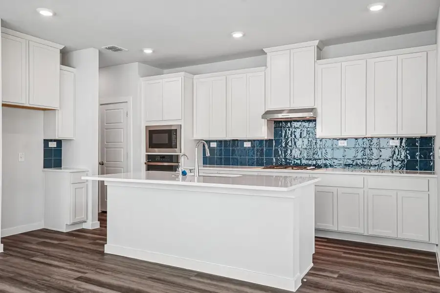 Furnished interior view inside a new home in The Meadows at Hunters Ranch, San Antonio (Image 6).