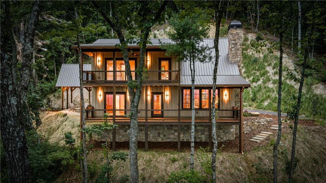 Exterior details and patio area of a home in , Ellijay (Image 23).