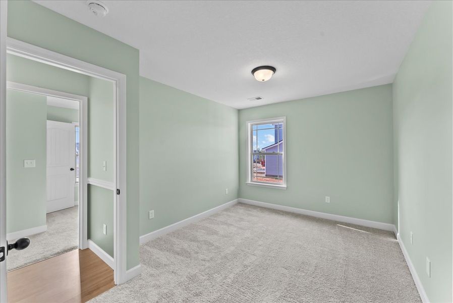 Representative unfurnished interior of a home built from the Rozlynn by Enchanted Homes in Guadalupe Heights, Seguin (Image 19).