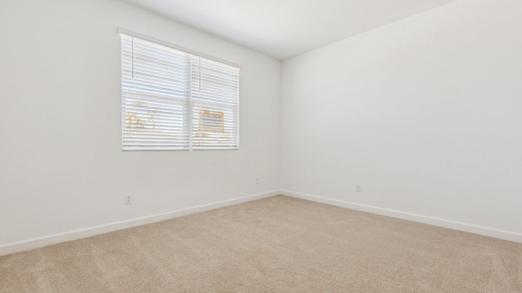 Spacious, unfurnished interior of a new home in Zanjero Pass, Waddell (Image 19).