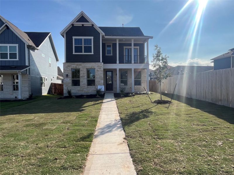 Exterior details and patio area of a home in The Cottages at Lariat, Liberty Hill (Image 18).