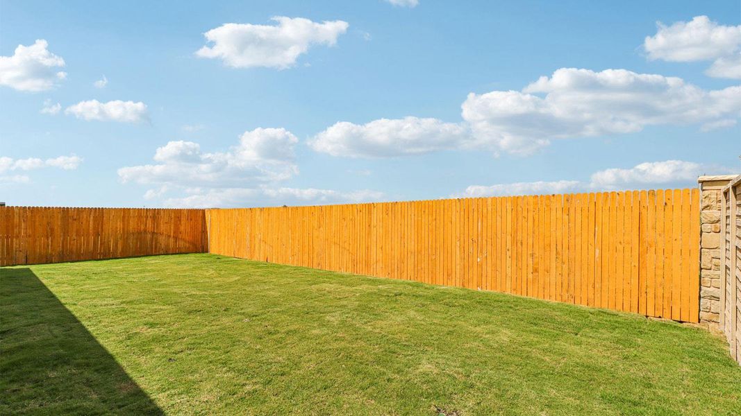 Exterior details and patio area of a home in Monarch Ranch, Manor (Image 18).