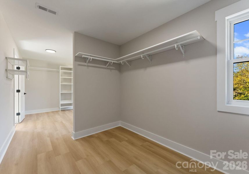 HUGE Walk In Primary Closet