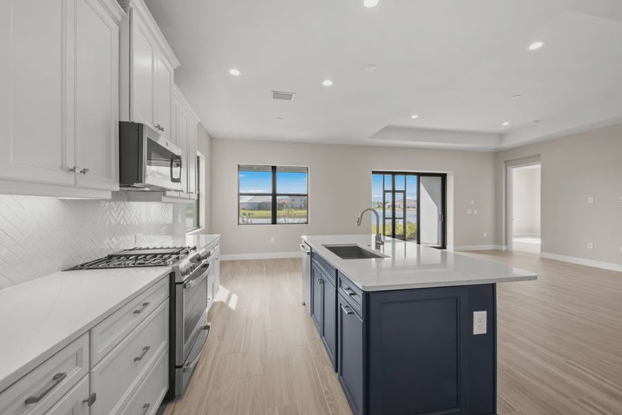 Representative furnished interior of a home built from the Eventide 4 by Neal Communities in SkySail, Naples (Image 7).