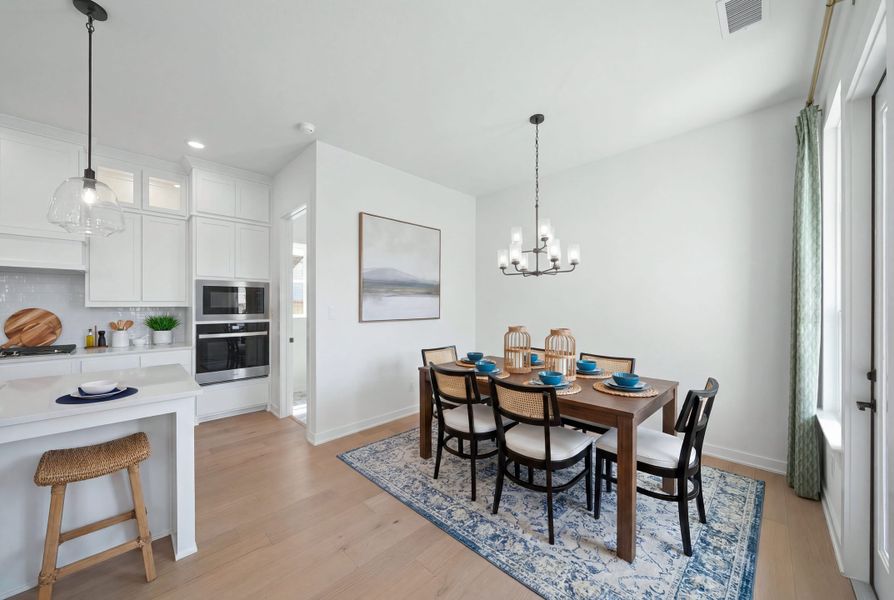Furnished interior view inside a new home in Light Farms Brenham - 40' Lots, Celina (Image 16).