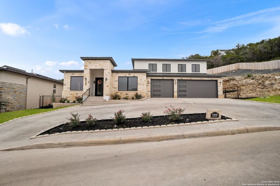 Front exterior of a new home in , San Antonio, TX, highlighting curb appeal (Image 1).