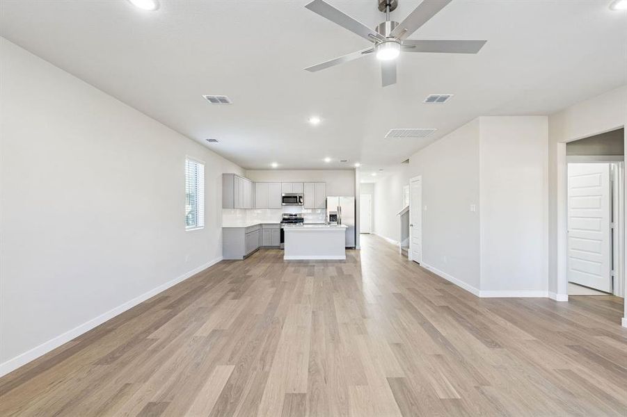 Open First Floor in the Haylee home plan by Trophy Signature Homes - REPRESENTATIVE PHOTO Open First Floor in the Haylee home plan by Trophy Signature Homes - REPRESENTATIVE PHOTO