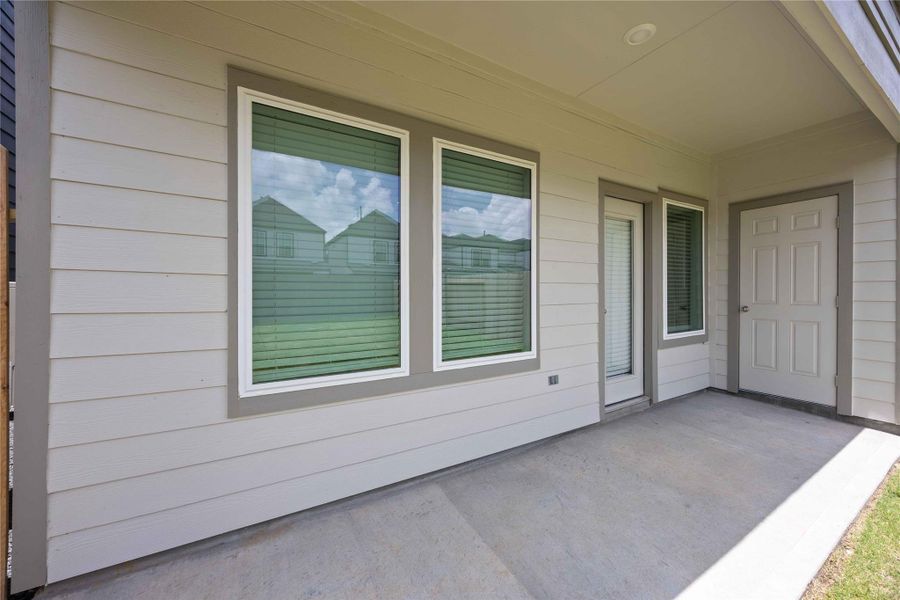 Exterior details and patio area of a home in Grand West, Houston (Image 2). Exterior details and patio area of a home in Grand West, Houston (Image 2).