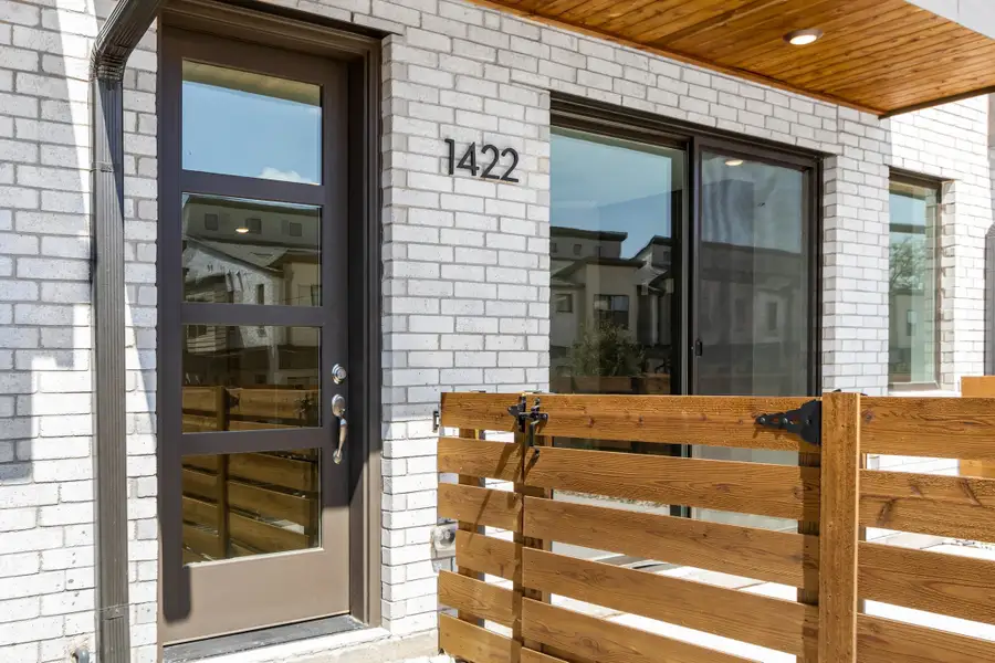 Exterior details and patio area of a home in Willow Grove Townhomes, Melissa (Image 3).
