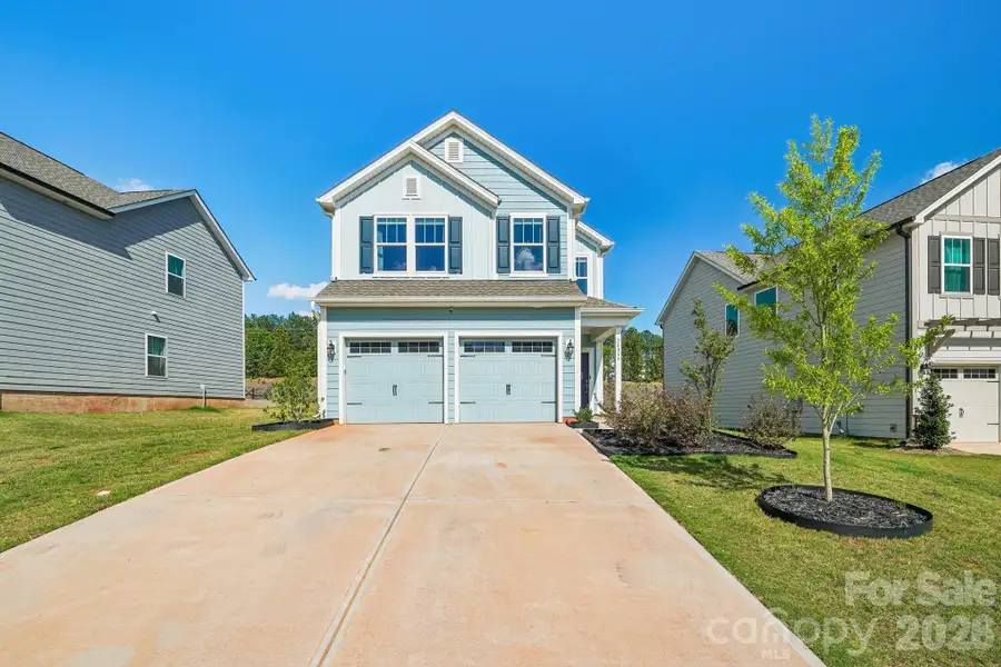Front exterior of a new home in Edgewater Lakeview On Your Lot, Lancaster, SC, highlighting curb appeal (Image 2). Front exterior of a new home in Edgewater Lakeview On Your Lot, Lancaster, SC, highlighting curb appeal (Image 2).