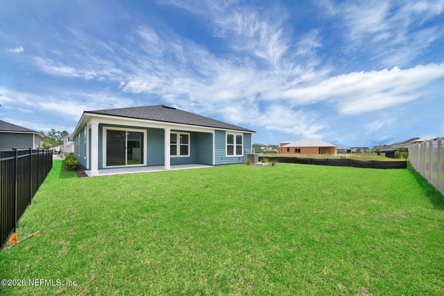 Exterior details and patio area of a home in Hyland Trail, Green Cove Springs (Image 34).
