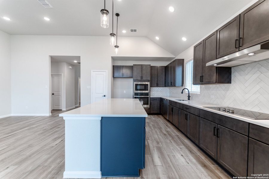 Furnished interior view inside a new home in The Woodlands at Medina Hills, Mico (Image 9).