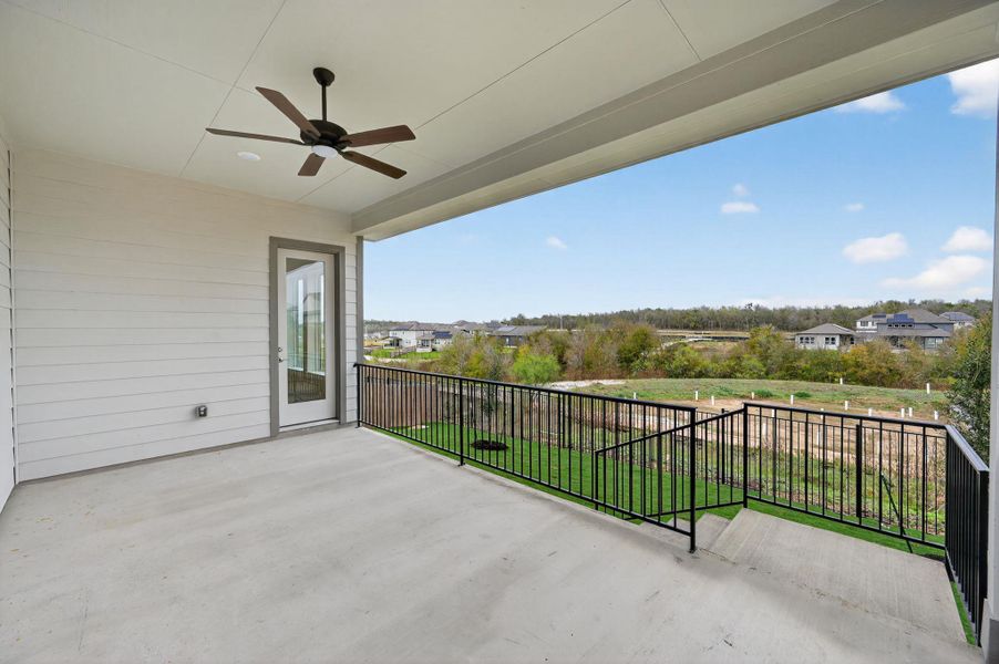 Balcony featuring a ceiling fan