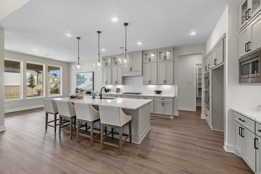 Furnished interior view inside a new home in Bridgeland, Cypress (Image 5).