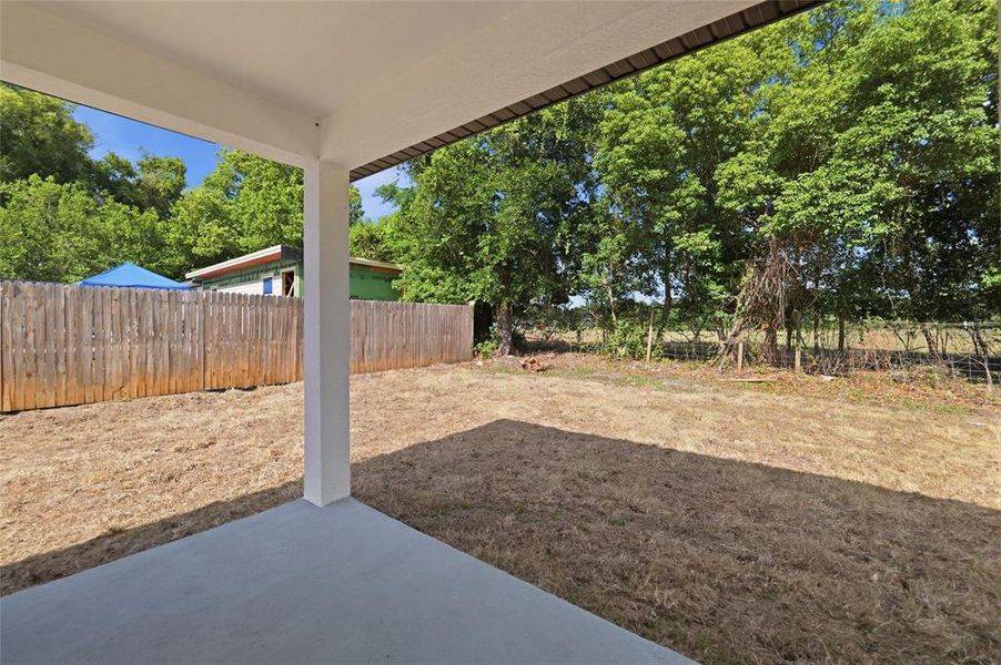 Exterior details and patio area of a home in , Dade City (Image 23).