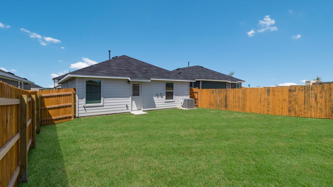 Representative exterior photo of a completed home built from the The Barton by D.R. Horton in Prairie Lakes, Buda, TX (Image 2).