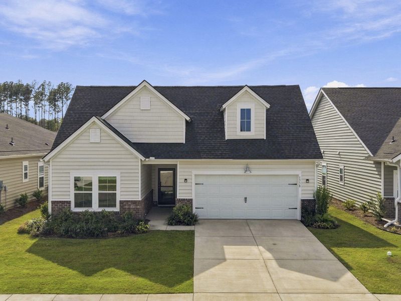Front exterior of a new home in Horizons at Summers Corner | 55+, Summerville, SC, highlighting curb appeal (Image 25).