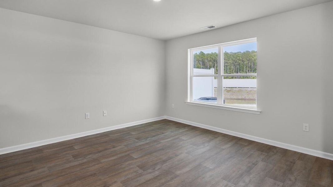 Spacious, unfurnished interior of a new home in Townes at Seabrooke, Leland (Image 14).