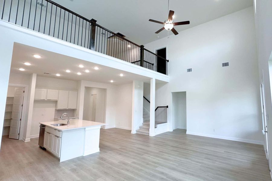 Furnished interior view inside a new home in Bluffview Reserve, Leander (Image 8).