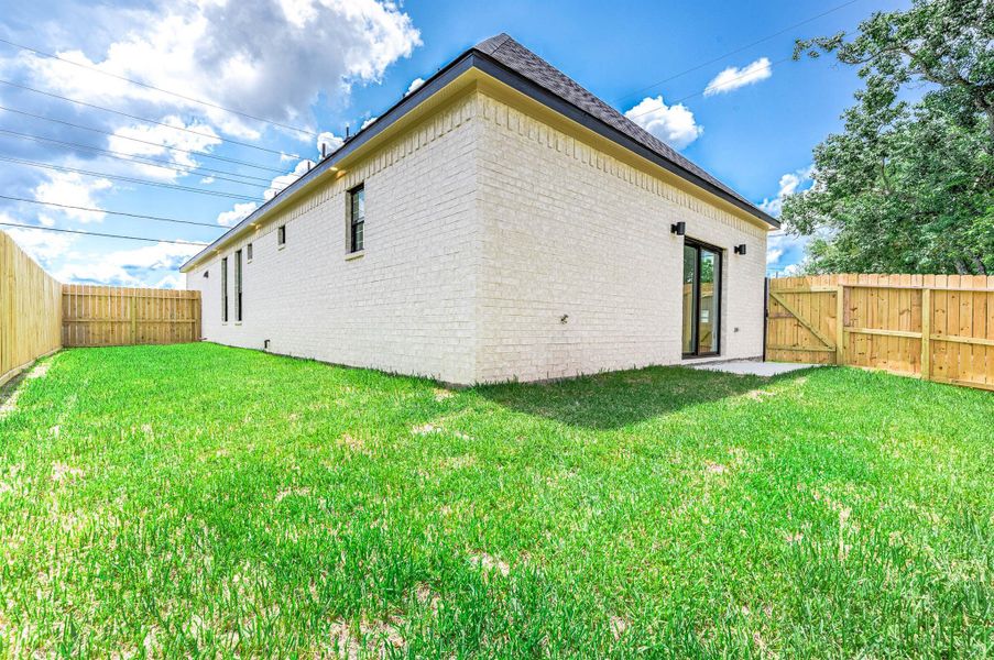 Exterior details and patio area of a home in , Needville (Image 25).